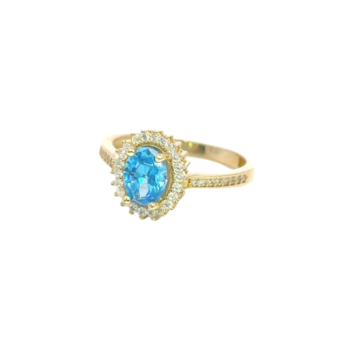 Blue Stone Ring Surrounded by Cubic Zirconia in 14K Gold - Dia Jewelry Store