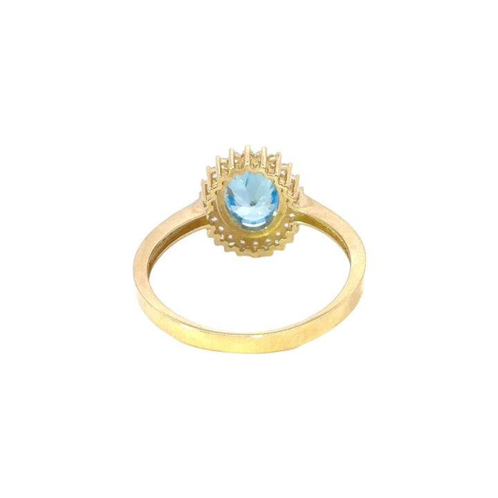 Blue Stone Ring Surrounded by Cubic Zirconia in 14K Gold - Dia Jewelry Store