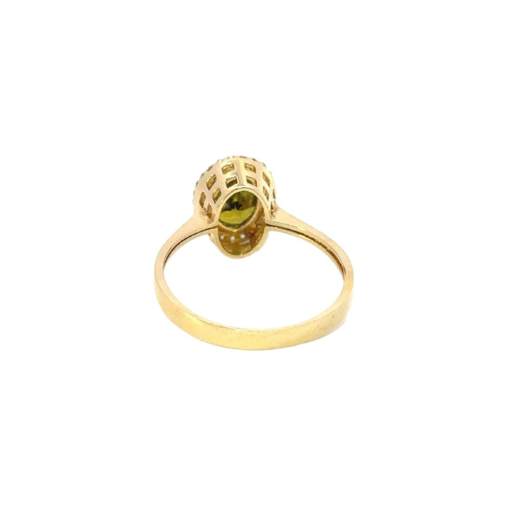 Light Green Ring Surrounded by Cubic Zirconia in 14K Gold - Dia Jewelry Store